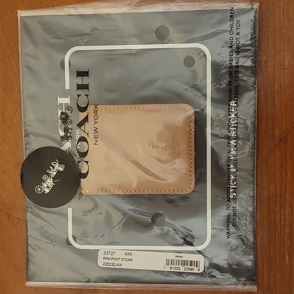 NWT Coach phone card holder